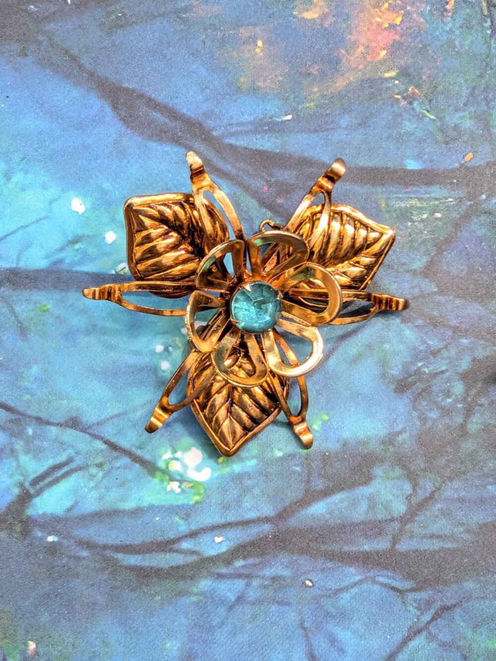 Vintage Flower Brooch with Openwork & Florentine Petals & Blue Rhinestone Center